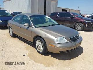 2003 Mercury Sable GS z VIN 1MEFM50U23A601955, wystawiony jako IAAI lot #42197171 z przebiegiem 94 977 mil mil oraz . Historia ofert i sprzedaży dostępna na DreamBid. Obrazek 1.