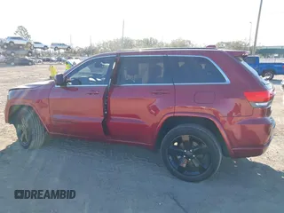 2014 Jeep Grand Cherokee Laredo with VIN 1C4RJEAG3EC519708, listed as a IAAI auction lot 41616364 with 131,184 mi miles. Bid and sale history available at carsss.com. Image 13.