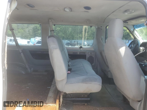 2012 Ford Econoline Passenger XL with VIN 1FBSS3BL5CDA01156, listed as a Copart auction lot 50744455 with 386,889 mi miles and Salvage title. Bid and sale history available at DreamBid. Image 11.