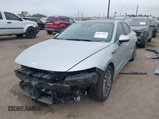 2024 Hyundai Sonata Hybrid Limited with VIN KMHL54JJ1RA087584, listed as a IAAI auction lot 41615405 with 18,684 mi miles. Bid and sale history available at carsss.com. Image 21.