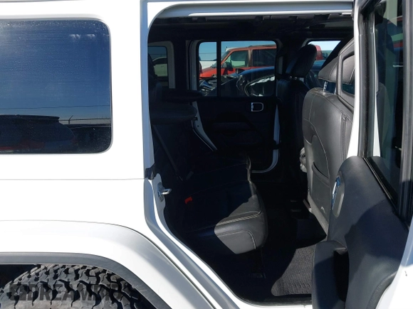 2019 Jeep Wrangler Unlimited Sahara с VIN 1C4HJXEN9KW509839, выставлен на аукционе IAAI как лот 41054085 с пробегом 78 850 миль миль и . История ставок и продаж доступна на DreamBid. Изображение 8.