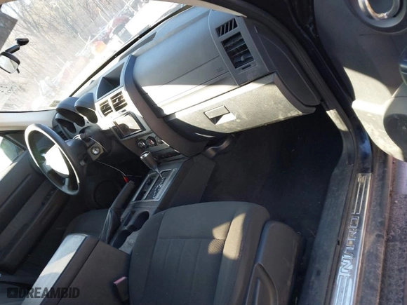 2011 Dodge Nitro Heat with VIN 1D4PU4GK1BW522673, listed as a IAAI auction lot 41448169 with 174,827 mi miles. Bid and sale history available at carsss.com. Image 5.