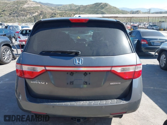 2011 Honda Odyssey Touring with VIN 5FNRL5H96BB009580, listed as a IAAI auction lot 42202595 with Not provided miles and . Bid and sale history available at DreamBid. Image 16.