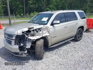 2015 Chevrolet Tahoe LT z VIN 1GNSCBKC7FR140125, wystawiony jako IAAI lot #42279760 z przebiegiem 201 335 mil mil oraz . Historia ofert i sprzedaży dostępna na DreamBid. Obrazek 17.
