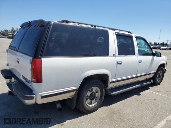 1999 Chevrolet Suburban with VIN 3GNEC16R0XG164600, listed as a Copart auction lot 49516445 with 105,747 mi miles and Salvage Title. Bid and sale history available at carsss.com. Image 3.