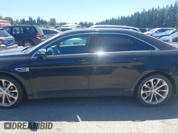 2015 Ford Taurus Limited with VIN 1FAHP2F82FG100260, listed as a IAAI auction lot 42677412 with 138,082 mi miles and . Bid and sale history available at DreamBid. Image 14.