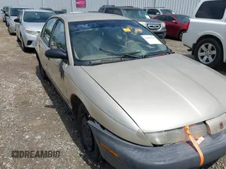 1998 Saturn SL z VIN 1G8ZH5281WZ186775, wystawiony jako IAAI lot #42454428 z przebiegiem Nie podano mil oraz . Historia ofert i sprzedaży dostępna na DreamBid. Obrazek 6.