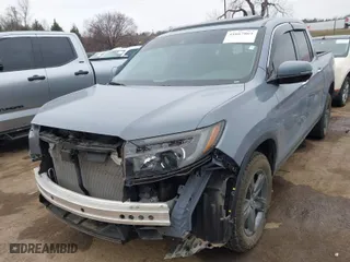 2023 Honda Ridgeline RTL-E with VIN 5FPYK3F70PB030718, listed as a IAAI auction lot 41667869 with 18,768 mi miles. Bid and sale history available at carsss.com. Image 6.