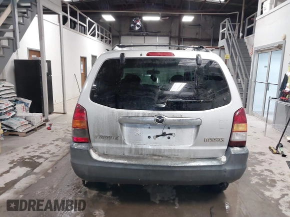 2003 Mazda Tribute DX with VIN 4F2YZ02B73KM43813, listed as a IAAI auction lot 41575708 with 202,214 mi miles and . Bid and sale history available at carsss.com. Image 16.
