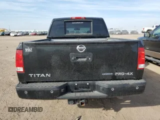 2015 Nissan Titan Pro-4X with VIN 1N6BA0EC9FN507495, listed as a Copart auction lot 49336715 with 95,749 mi miles and Clean title. Bid and sale history available at DreamBid. Image 6.