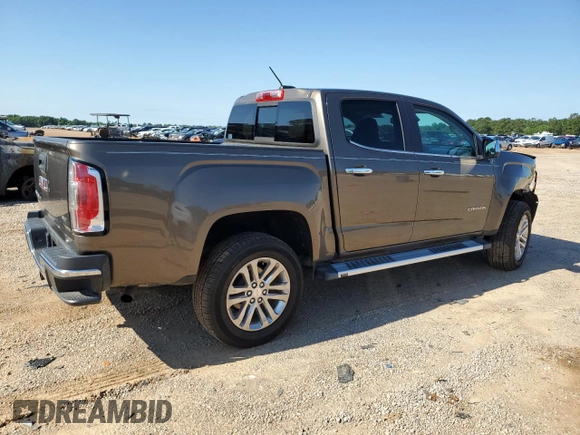 2017 GMC Canyon 2WD SLT z VIN 1GTG5DEN2H1148667, wystawiony jako Copart lot #54824735 z przebiegiem 36 861 mil mil oraz Szkody całkowita. Historia ofert i sprzedaży dostępna na DreamBid. Obrazek 3.