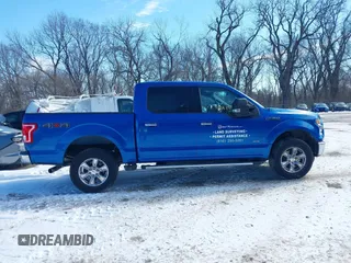 2015 Ford F-150 XLT with VIN 1FTEW1EG1FFA87638, listed as a IAAI auction lot 41597302 with 143,400 mi miles. Bid and sale history available at carsss.com. Image 14.