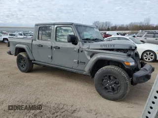 2023 Jeep Gladiator Willys z VIN 1C6HJTAG0PL507803, wystawiony jako Copart lot #48526875 z przebiegiem 51 811 mil mil oraz Czysty tytuł • Clean title. Historia ofert i sprzedaży dostępna na DreamBid. Obrazek 4.