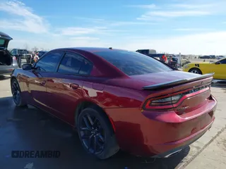 2020 Dodge Charger SXT with VIN 2C3CDXBG3LH104815, listed as a IAAI auction lot 41328084 with 130,322 mi miles and . Bid and sale history available at DreamBid. Image 3.