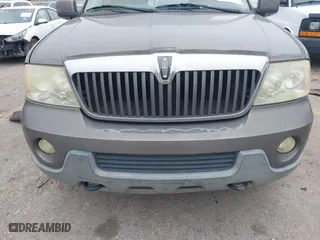 2004 Lincoln Navigator Luxury with VIN 5LMFU27RX4LJ41623, listed as a IAAI auction lot 41565114 with 214,590 mi miles. Bid and sale history available at carsss.com. Image 12.