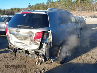 2012 Kia Sorento LX with VIN 5XYKT3A65CG240227, listed as a IAAI auction lot 41009682 with 276,573 mi miles. Bid and sale history available at carsss.com. Image 4.