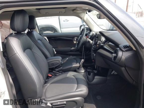 2021 MINI Hardtop Cooper with VIN WMWXR3C09M2N96671, listed as a IAAI auction lot 42031023 with 12,450 mi miles and . Bid and sale history available at DreamBid. Image 5.