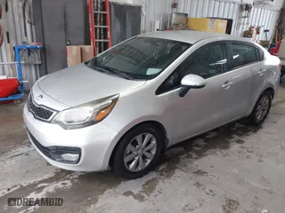 2014 Kia Rio EX with VIN KNADN4A35E6396673, listed as a IAAI auction lot 41964655 with 159,644 mi miles. Bid and sale history available at carsss.com. Image 2.