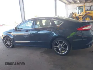 2014 Ford Fusion Titanium with VIN 3FA6P0K97ER328482, listed as a IAAI auction lot 40252350 with 137,128 mi miles. Bid and sale history available at carsss.com. Image 14.