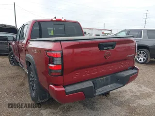 2023 Nissan Frontier Pro-4X z VIN 1N6ED1EK4PN652544, wystawiony jako IAAI lot #41309698 z przebiegiem 26 173 mil mil oraz . Historia ofert i sprzedaży dostępna na DreamBid. Obrazek 3.