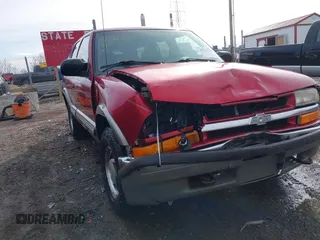 2000 Chevrolet Blazer LT z VIN 1GNDT13W2Y2163805, wystawiony jako IAAI lot #41537780 z przebiegiem 170 527 mil mil oraz . Historia ofert i sprzedaży dostępna na DreamBid. Obrazek 1.