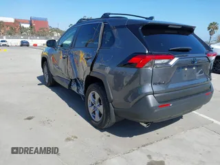 2024 Toyota RAV4 Hybrid LE with VIN JTMMWRFV0RD248035, listed as a IAAI auction lot 42339244 with 18,317 mi miles and . Bid and sale history available at DreamBid. Image 3.