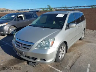 2005 Honda Odyssey EX-L with VIN 5FNRL38795B039731, listed as a IAAI auction lot 41844588 with 150,738 mi miles. Bid and sale history available at carsss.com. Image 2.
