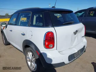 2013 MINI Cooper Countryman with VIN WMWZB3C51DWM31277, listed as a IAAI auction lot 41506486 with 79,006 mi miles. Bid and sale history available at carsss.com. Image 3.