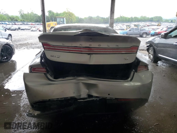 2015 Lincoln MKZ z VIN 3LN6L2GK4FR613117, wystawiony jako Copart lot #54141735 z przebiegiem 129 072 mil mil oraz Szkoda całkowita • Salvage title. Historia ofert i sprzedaży dostępna na DreamBid. Obrazek 6.