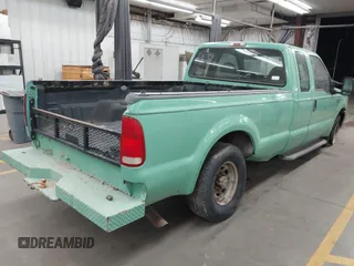 1999 Ford Super Duty F-250 XL with VIN 1FTNX20F9XEA58381, listed as a IAAI auction lot 40625121 with 321,045 mi miles. Bid and sale history available at carsss.com. Image 4.