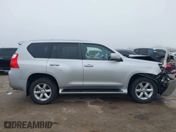 2010 Lexus GX 460 with VIN JTJBM7FX7A5014182, listed as a IAAI auction lot 41500959 with 183,832 mi miles and . Bid and sale history available at DreamBid. Image 14.