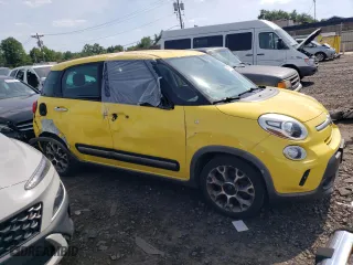 2014 FIAT 500L Trekking with VIN ZFBCFADH2EZ023643, listed as a Copart auction lot 61457174 with 84,309 mi miles and Salvage Title. Bid and sale history available at carsss.com. Image 4.