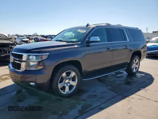 2018 Chevrolet Suburban Premier z VIN 1GNSKJKC9JR241480, wystawiony jako Copart lot #50569895 z przebiegiem 71 469 mil mil oraz Szkoda całkowita • Salvage title. Historia ofert i sprzedaży dostępna na DreamBid. Obrazek 1.