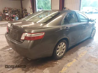 2007 Toyota Camry z VIN JTNBB46K573017707, wystawiony jako IAAI lot #42230423 z przebiegiem 140 843 mil mil oraz . Historia ofert i sprzedaży dostępna na DreamBid. Obrazek 4.