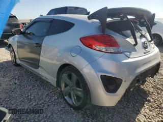 2015 Hyundai Veloster Turbo z VIN KMHTC6AE4FU221891, wystawiony jako Copart lot #58857565 z przebiegiem 144 671 mil mil oraz Szkoda całkowita • Salvage title. Historia ofert i sprzedaży dostępna na DreamBid. Obrazek 2.
