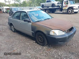 2000 Honda Civic VP z VIN 2HGEJ6610YH552547, wystawiony jako IAAI lot #42546960 z przebiegiem 128 427 mil mil oraz . Historia ofert i sprzedaży dostępna na DreamBid. Obrazek 1.