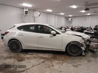 2015 Mazda 3 i Sport with VIN JM1BM1K79F1270618, listed as a IAAI auction lot 41394651 with 55,999 mi miles and . Bid and sale history available at DreamBid. Image 13.