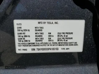 2023 Tesla Model Y Long Range z VIN 7SAYGDEE8PA185193, wystawiony jako Copart lot #48706215 z przebiegiem 10 451 mil mil oraz Szkoda całkowita • Salvage title. Historia ofert i sprzedaży dostępna na DreamBid. Obrazek 14.