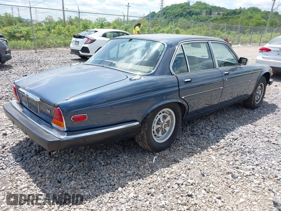1987 Jaguar XJ with VIN SAJAV1348HC477152, listed as a IAAI auction lot 42274741 with Not provided miles and . Bid and sale history available at DreamBid. Image 4.