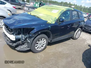 2016 Mazda CX-5 Touring with VIN JM3KE4CY0G0916908, listed as a IAAI auction lot 41848823 with 53,255 mi miles. Bid and sale history available at carsss.com. Image 17.