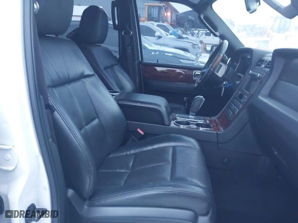 2012 Lincoln Navigator L with VIN 5LMJJ3J59CEL07440, listed as a IAAI auction lot 41257032 with 100,073 mi miles. Bid and sale history available at carsss.com. Image 5.