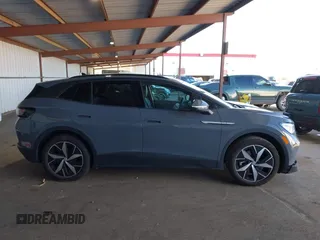 2023 Volkswagen ID.4 S z VIN 1V25MPE84PC055981, wystawiony jako IAAI lot #41670418 z przebiegiem 15 634 mil mil oraz . Historia ofert i sprzedaży dostępna na DreamBid. Obrazek 13.