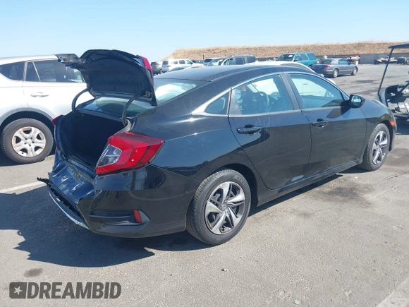 2020 Honda Civic LX with VIN 2HGFC2F67LH574850, listed as a IAAI auction lot 40429352 with 41,063 mi miles and . Bid and sale history available at DreamBid. Image 4.