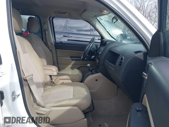 2014 Jeep Patriot Latitude with VIN 1C4NJRFB0ED778170, listed as a IAAI auction lot 41870418 with 54,624 mi miles. Bid and sale history available at carsss.com. Image 5.