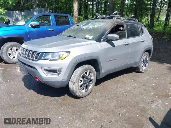 2018 Jeep Compass Trailhawk with VIN 3C4NJDDB5JT130317, listed as a IAAI auction lot 42470070 with 95,000 mi miles and . Bid and sale history available at DreamBid. Image 2.