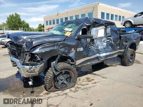 2014 Ram 2500 Laramie with VIN 3C6UR5NL5EG144483, listed as a Copart auction lot 73720324 with 137,360 mi miles and Salvage title. Bid and sale history available at DreamBid. Image 1.
