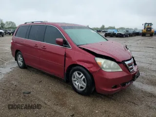 2006 Honda Odyssey EX-L z VIN 5FNRL38756B416802, wystawiony jako Copart lot #57588515 z przebiegiem 169 093 mil mil oraz Szkoda całkowita • Salvage title. Historia ofert i sprzedaży dostępna na DreamBid. Obrazek 4.