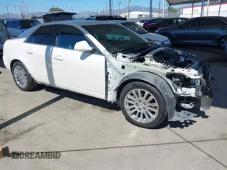 2012 Cadillac CTS Premium z VIN 1G6DP5E33C0134831, wystawiony jako IAAI lot #42638869 z przebiegiem 89 948 mil mil oraz . Historia ofert i sprzedaży dostępna na DreamBid. Obrazek 1.