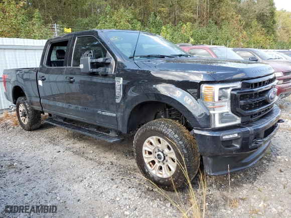 2022 Ford Super Duty F-350 SRW XL with VIN 1FT8W3BT6NEE48974, listed as a Copart auction lot 74527544 with 24,717 mi miles and Salvage Title. Bid and sale history available at carsss.com. Image 4.