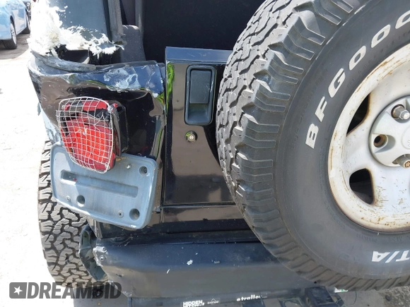 2002 Jeep Wrangler X with VIN 1J4FA39S32P738246, listed as a IAAI auction lot 42106359 with 266,993 mi miles and . Bid and sale history available at DreamBid. Image 17.